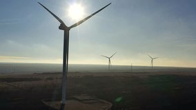 
Wind generators for electricity, generators in the fields in winter, video from a drone 4k