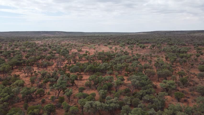 Drone flying over a rugged landscape in the Australian Outback