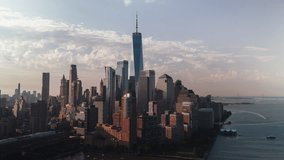 Establishing Aerial View Shot of New York City NYC, Downtown Manhattan, One World Trade Center, Wall Street, New York Stock Exchange, Woolworth Building, beautiful soft morning light