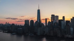 Establishing Aerial View Shot of New York City NYC, Downtown Manhattan, One World Trade Center, Wall Street, New York Stock Exchange, Woolworth Building, mesmerising sunrise, super view