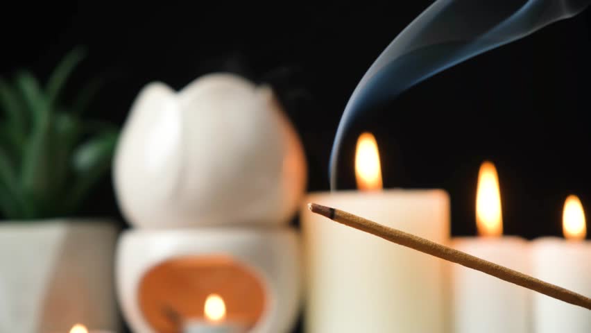 Aroma lamp and burning incense stick for aromatherapy - Powered by Shutterstock - Get 15% off with code: PIKWIZARD15