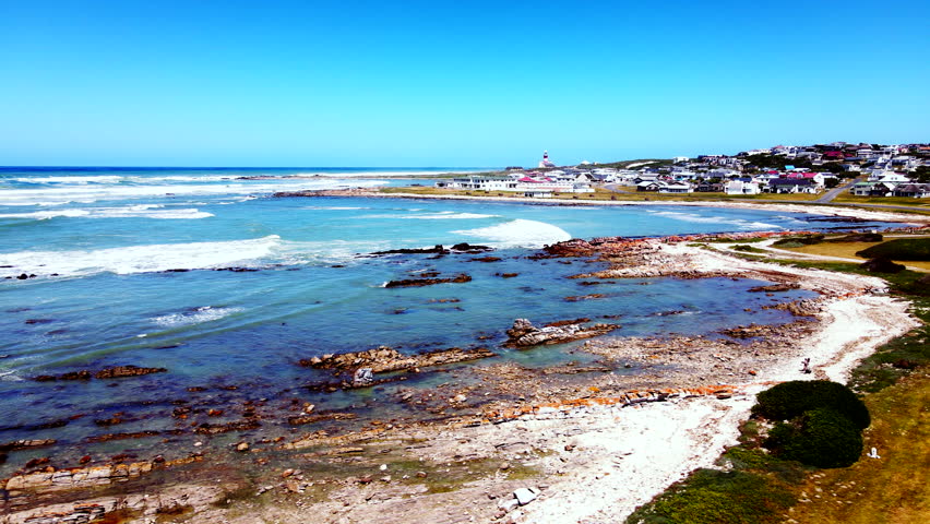Coastal village of L'Agulhas at southernmost tip of Africa, Overberg. Aerial Royalty-Free Stock Footage #1111485897