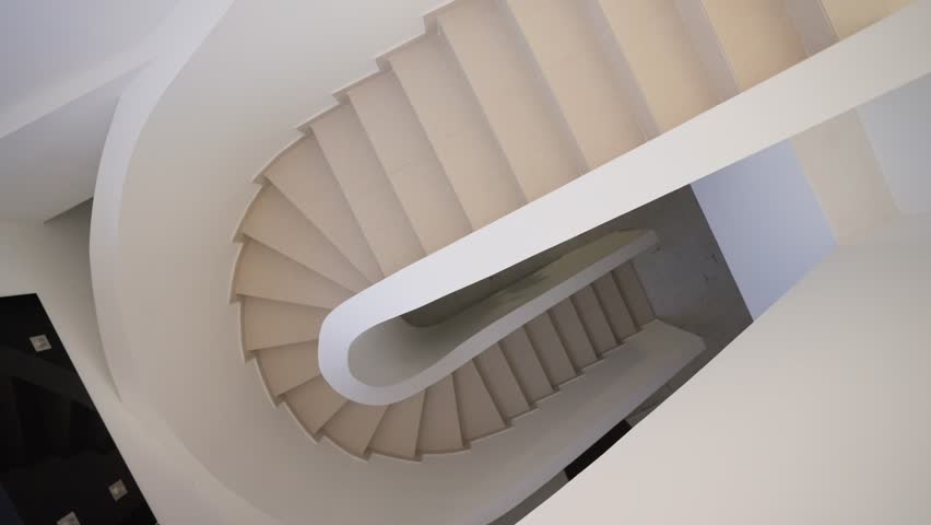 Beautiful luxurious white staircase in a curved style in a minimalist interior. Slow motion, top view. | Shutterstock HD Video #1111488875