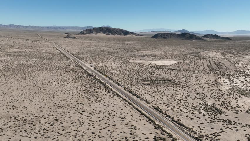 California Road. Mojave Park At Essex In California United States. Famous National Park Landscape. Route 66 Travel. Mojave Park At Essex California United States. California Desert. Desert Road.