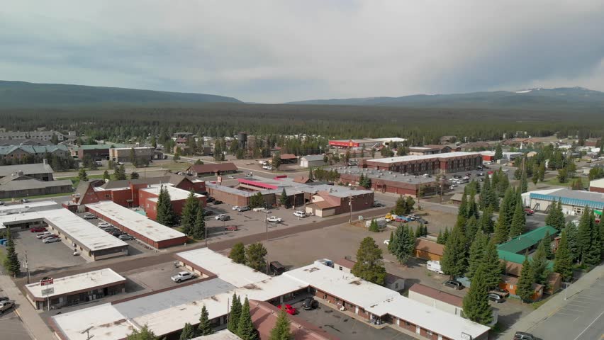 Daytime aerial of West Yellowstone, located near the west entrance of Yellowstone National Park, an popular destination with a rich history and a variety of attractions and activities.