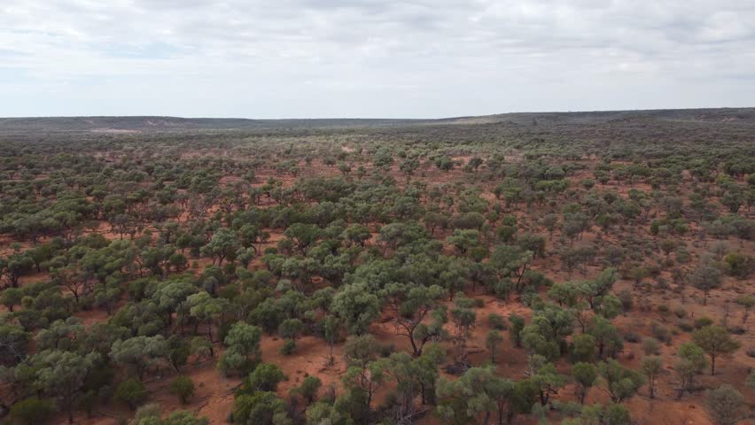 Drone flying over a very rough remote landscape in the Australian outback