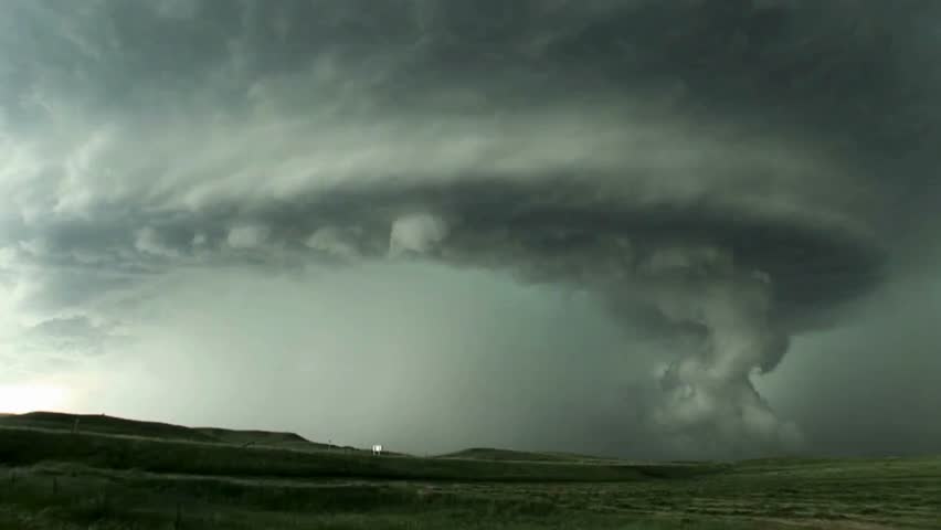 Time lapse of tornado warned supercell storm rolling through the Nebraska plains as it moves over the landscape as it changes shape.