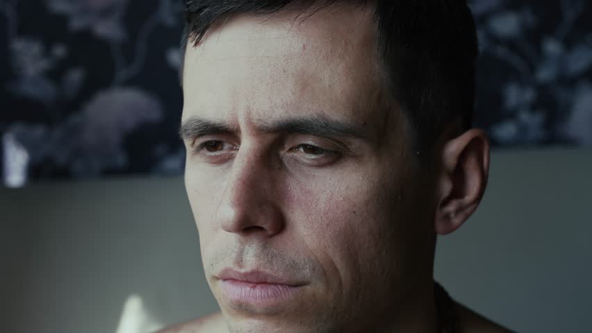 Sad upset man in the room | Shutterstock HD Video #1111529393