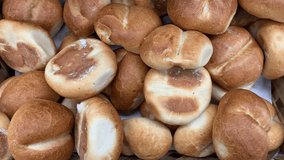 Video of a group of breads in a local market. Concept of bakeries and food.