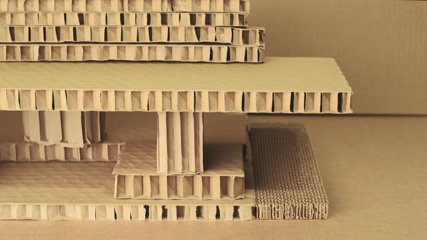 In a fundamental architectural exercise, students meticulously craft and display their projects. Using recycled paper material, they construct intricate cardboard house models in three dimensions, emb | Shutterstock HD Video #1111535817