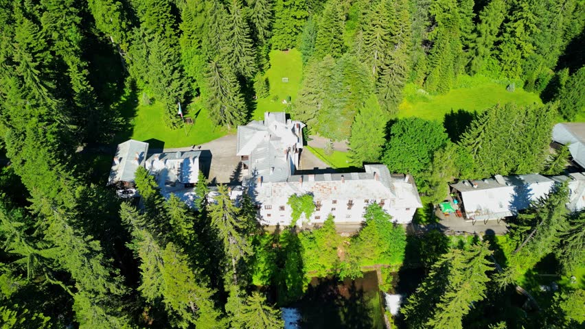 Drone View of of ancient palace and the nature in the old park Tsarska or Royal Bistritsa near by resort Borovets, Rila Royalty-Free Stock Footage #1111536769