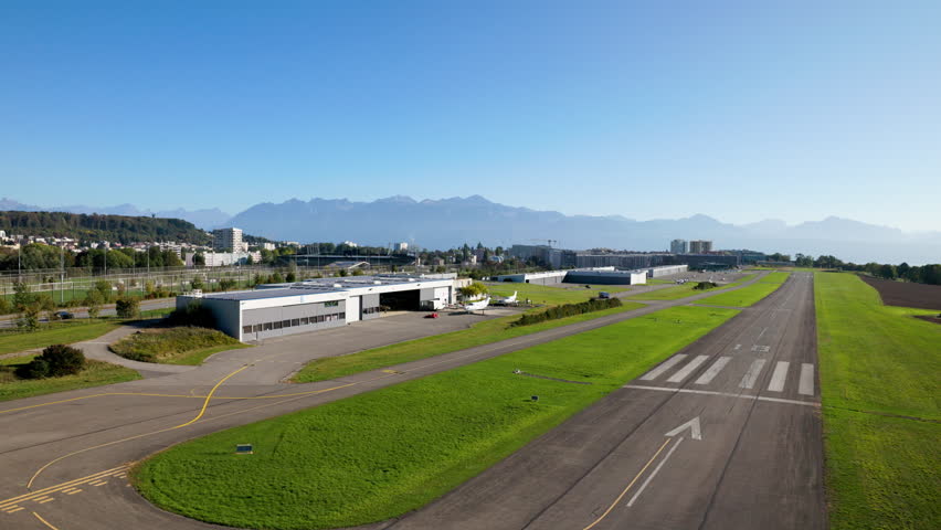 POV of Helicopter Landing At Lausanne Airport - Lausanne-Blecherette Airport In Lausanne, Switzerland. - aerial shot