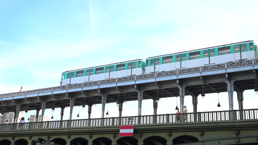 The parisian urban subway (MP 73 metro, metropolitain) passes over a bridge (pont de Bir-Hakeim Passy line 6) in the French capital, Paris, France.