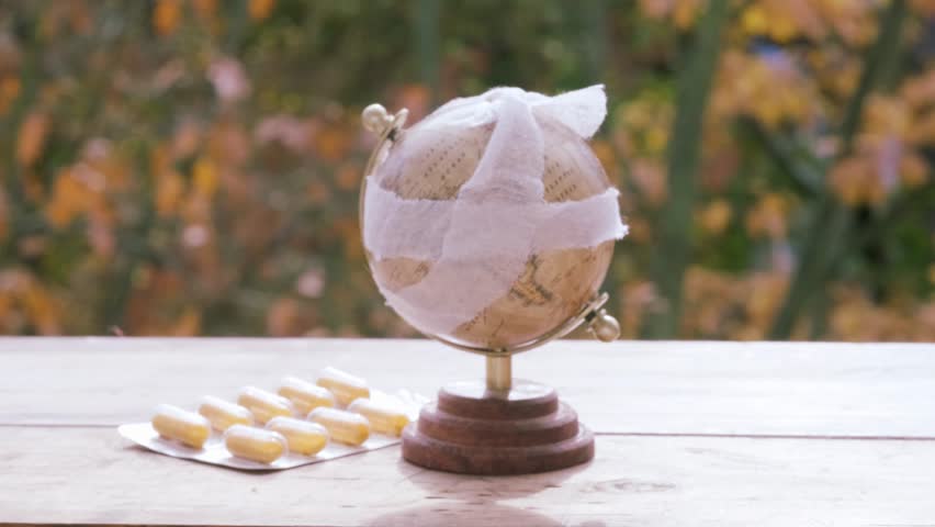 bandaged globe, planet sick concept, global warming, climate change, support environmental activism and raise societal awareness, rising temperatures, ecological imbalance, planetary heating Royalty-Free Stock Footage #1111540273