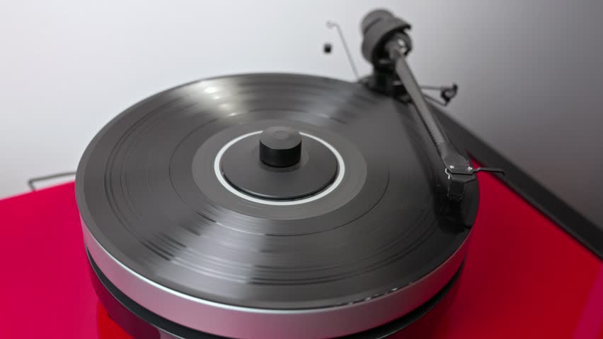 Сlose-up view of playing vinyl record on Hi-Fi turntable. | Shutterstock HD Video #1111548735