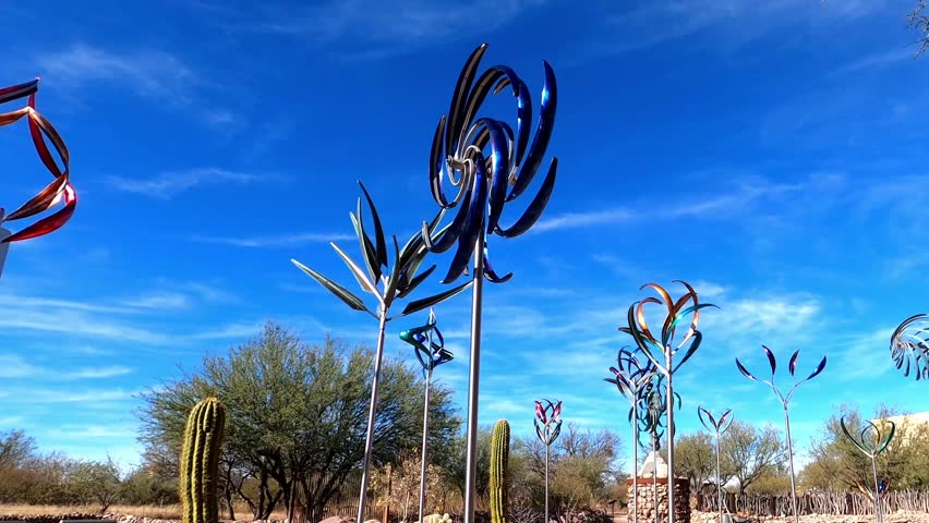 Turning windmills with multiple vane shapes and colors