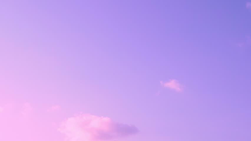 Pure Colorful Pink Lilac Marmalade Sunset Sky and Pink Puffy Cloud Slow Motion Time Lapse. Amazing Clear Evening Firmament and Fluffy Colored Cloud, Timelapse. Beauty Relax Colorful Atmosphere Heaven.