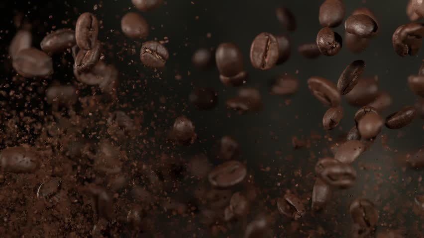 Super Slow Motion Shot of Flying Coffee Beans and Ground Coffee Isolated on Black at 1000fps. | Shutterstock HD Video #1111575377