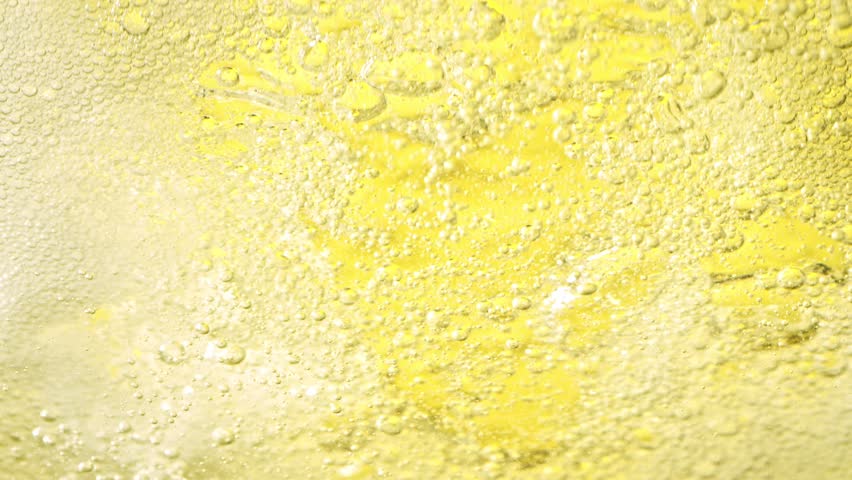 Super Slow Motion Shot of Bubbling Yellow Lemonade Abstract Background at 1000fps. | Shutterstock HD Video #1111575395