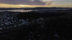Drone footage, aerial video, Stavanger, Norway, sunrise, city center, harbor, suburbs, traffic, nature, beauty, stunning, captivating, breathtaking, travel destination, real estate, stock footage, doc