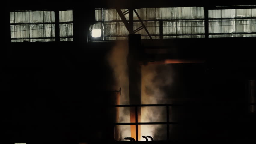 Bright Fire Flame And Smoke On Dark Background. Cast Workshop. Blacksmith. Rail Car Manufacturing Factory. Metal Production. Steel details. Wide Shot. Industrial. Heavy Machinery. Iron Works. | Shutterstock HD Video #1111586471
