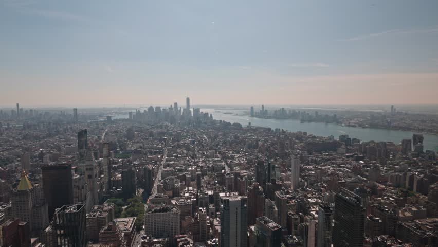 Beautiful panoramic view of Manhattan, with Hudson River, Statue of Liberty and skyscrapers in sight. New York. USA.  | Shutterstock HD Video #1111586853