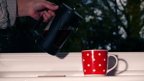 Making fresh coffee in Cafetiere at home in window medium shot slow motion 4k selective focus - Powered by Shutterstock - Get 15% off with code: PIKWIZARD15