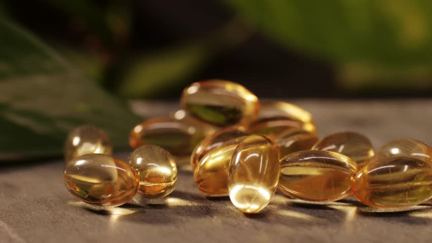Omega fish oil gel capsules close-up . Omega vitamins pills 3 6 9. To be healthy and take care of your health. Pharmaceutical industry. Business of biological supplements and vitamin. | Shutterstock HD Video #1111589821