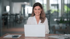 Happy mature business woman entrepreneur in office using laptop at work, smiling professional middle aged 40 years old female company executive wearing suit working on computer at workplace. - Powered by Shutterstock - Get 15% off with code: PIKWIZARD15