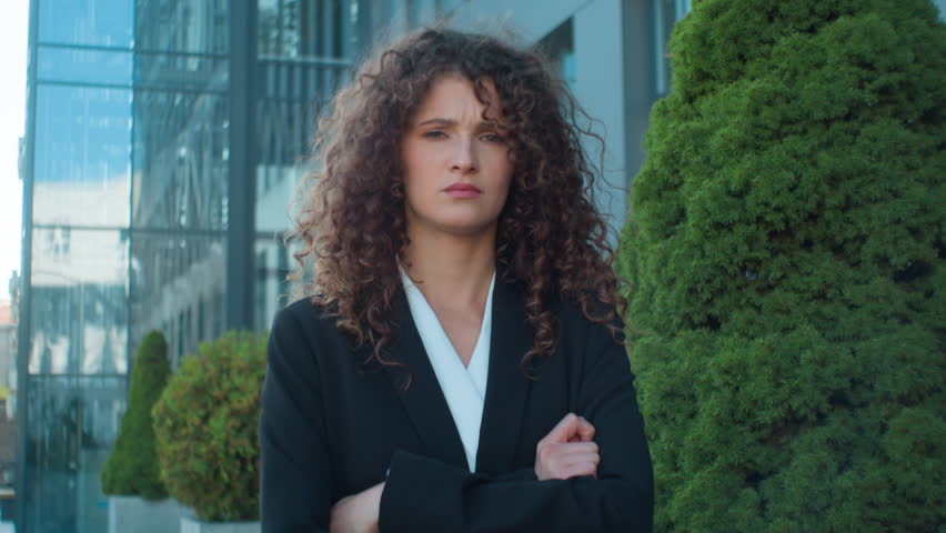 Portrait Caucasian dissatisfied woman look at camera crossed hands answer not never negative young businesswoman girl female business boss leader director waving head no forbid refusal in city outside | Shutterstock HD Video #1111598715
