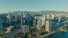 Aerial Video of downtown Vancouver looking to the North near the Cambie bridge.