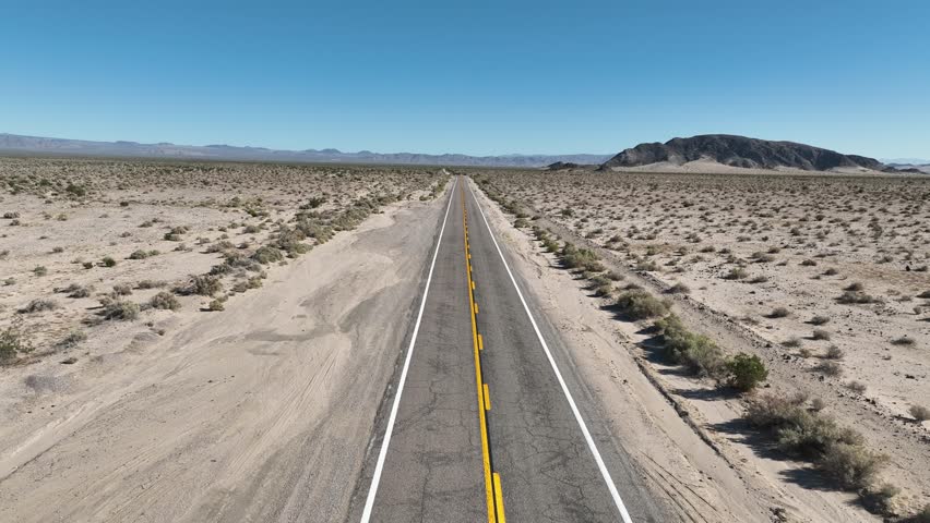 Desert Road At Essex In California United States. Famous National Park Landscape. Route 66 Travel. Desert Road At Essex In California United States. California desert. California landscape.