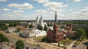 Aerial 4K video from drone to Daugavpils Martin Luther Cathedral of the Blessed Virgin Mary on a beautiful sunny summer day. Daugavpils, Latvia, Latgale, Europe

