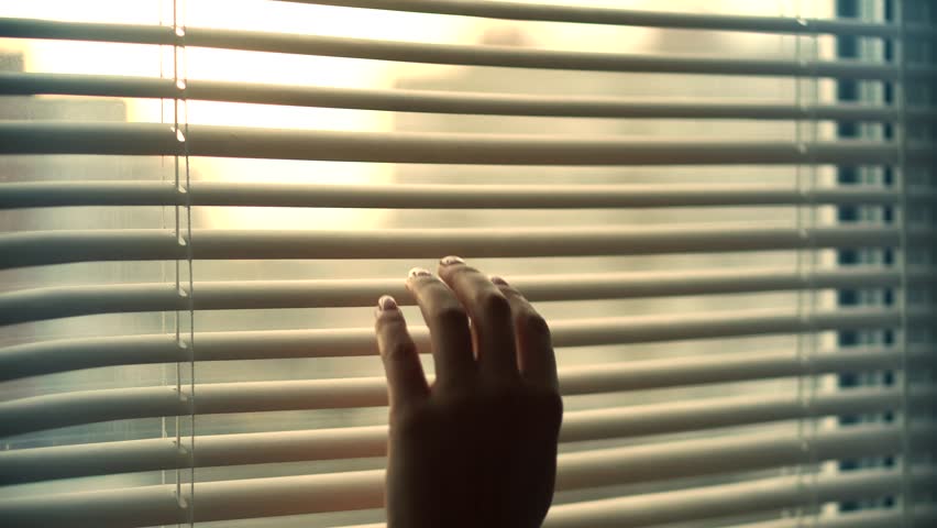 Opening Window Jalousie Blinds At Sunrise.Pulling Down Window Blind On Sunset. Sunlight Behind Window Blinds Vertical Jalousie. Opening Slats Home Venetian Blinds . Woman Looking Through Window Blinds Royalty-Free Stock Footage #1111620793