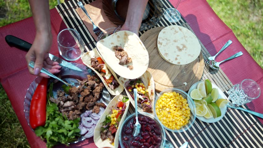 Tasty Mexican Tacos Filled Meat. Homemade American Soft Shell Beef Tacos. Mexican Food Burrito. Tortilla Fast Food. Mexican Pork Carnitas Tacos Fajitas. American Taco Salsa Corn Tortilla Carne Asada | Shutterstock HD Video #1111620813
