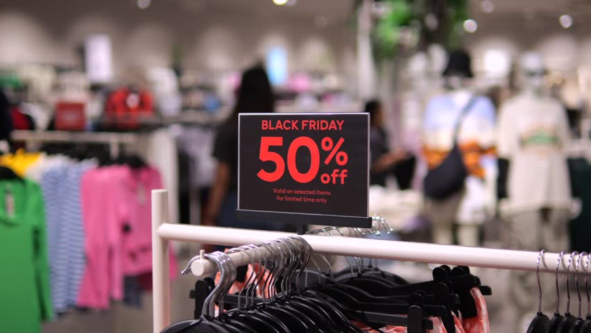 Sign with inscription Black Friday discounts up to 50 percent off. Seasonal discounts in supermarkets and boutiques best marketing strategy to attract customers. Discount concept to increase demand