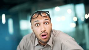 Wonder employee entrepreneur man looks at canera read unbelievable astonish news excited guy male Shocked with mobile phone receive smartphone sms amazed say wow shock amazement at business office - Powered by Shutterstock - Get 15% off with code: PIKWIZARD15