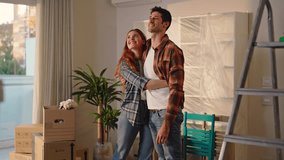 A young couple of beautiful guys enter the new house carrying boxes.
They put down the boxes, look at their new home and embrace each other in love - Powered by Shutterstock - Get 15% off with code: PIKWIZARD15