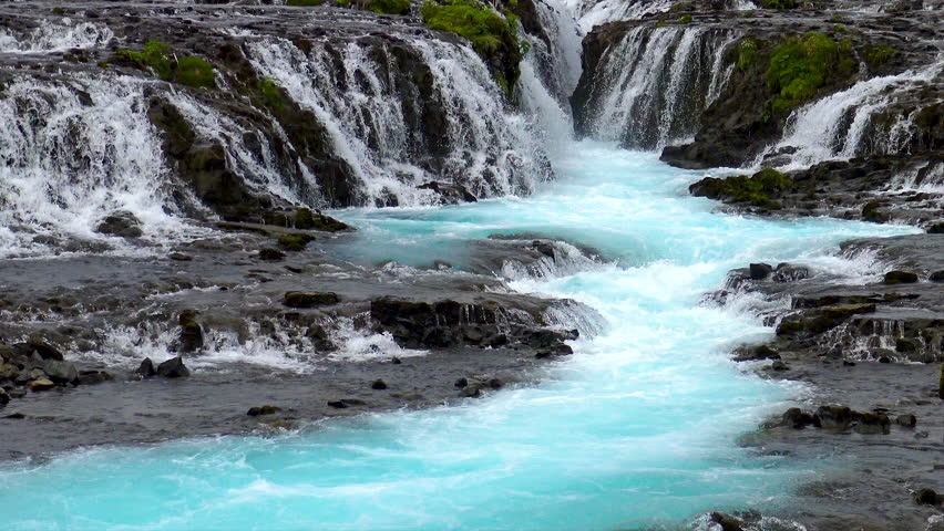 Aerial view of the beautiful Bruarfoss waterfall and Bruara River which glacier melt from Langjökull glacier in the Golden Circle of Iceland.