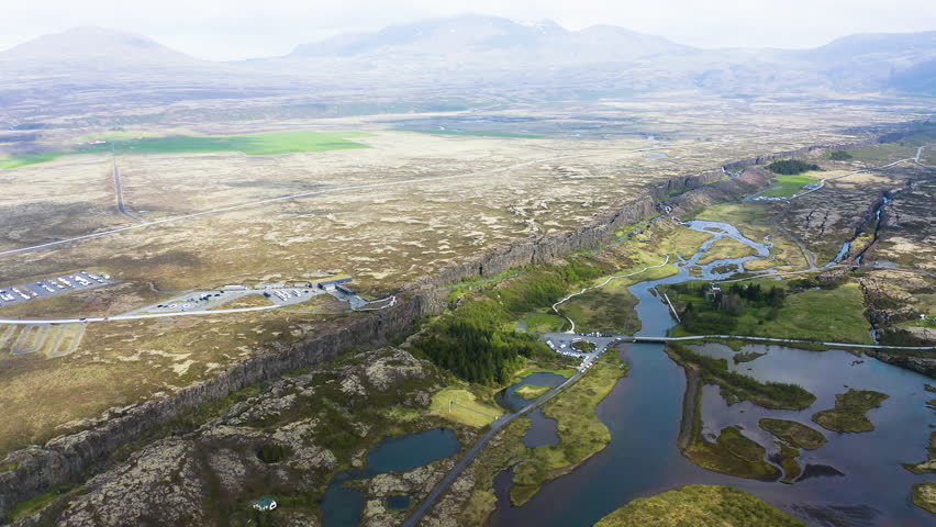 Aerial view of the beautiful Oxararfoss waterfall between tectonic plates, inside the Thingvellir National Park, Iceland.