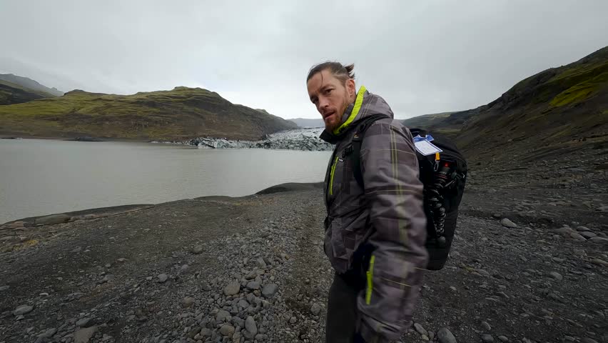Hiker Approaching Glacier Lagoon. exploring in Iceland
