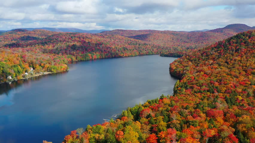 Aerial view of Fall (Autumn) foliage around Pine Lake in New York State.