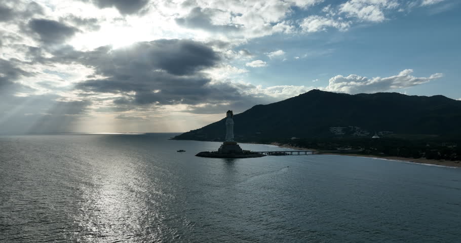 Aerial footage of Guanyin statue at seaside in nanshan temple, hainan island , China