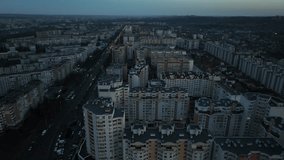 Chisinau from above, shot on flying drone, aerial view of the twilight city. 