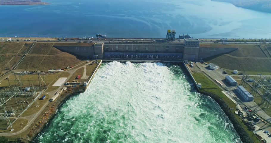 Panoramic view of Large Hydropower System - Dam Store River Water in a Reservoir. Renewable Energy Source. Pumped-Storage Hydro Power Plant | Shutterstock HD Video #1111663313
