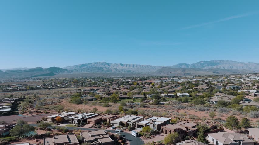 Pullback aerial view of Ivins, Utah in southern Utah Royalty-Free Stock Footage #1111673899