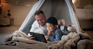 Tablet, child and father with bedroom fort for social media, video or online gaming app at home. Website, dad and boy together with bonding, streaming and movie with duvet and internet in a house