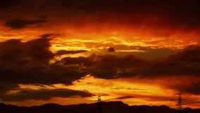 sunset or sunrise time,Beautiful nature landscape background,Sun Timelapse nature cloudscape sky and Clouds moving away rolling 4k colorful dark