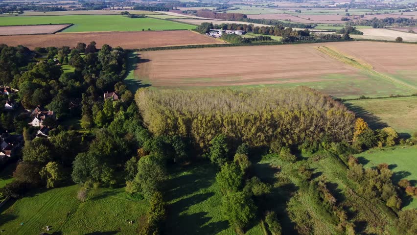 Aerial view of plowed and fallow fields in the English countryside