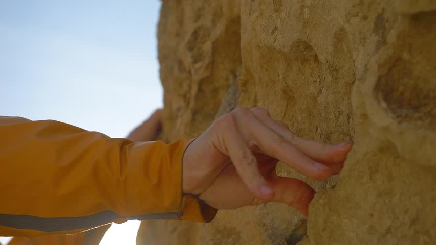 Rock climber scales a cliff slow motion. male hands close up. rock climbing outdoor, bouldering | Shutterstock HD Video #1111684307